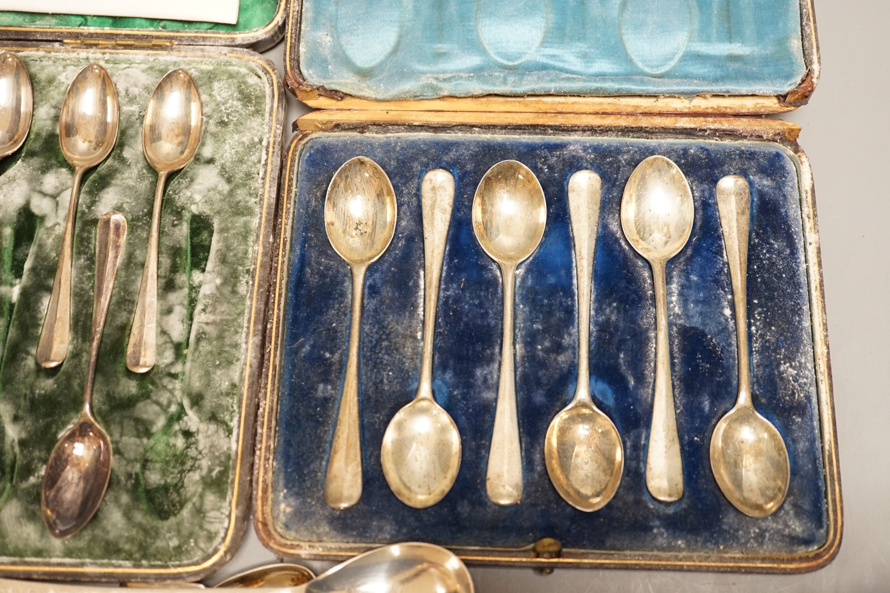 A quantity of 19th century and later assorted silver cutlery, including Edwardian basting spoon, various dates and makers, ten dessert eaters, a set of six Chinese white metal teaspoons by Wang Hing, two cased sets of si